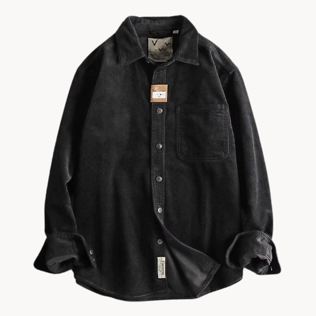Stack of folded men's casual corduroy shirts in various colors, showcasing fabric texture