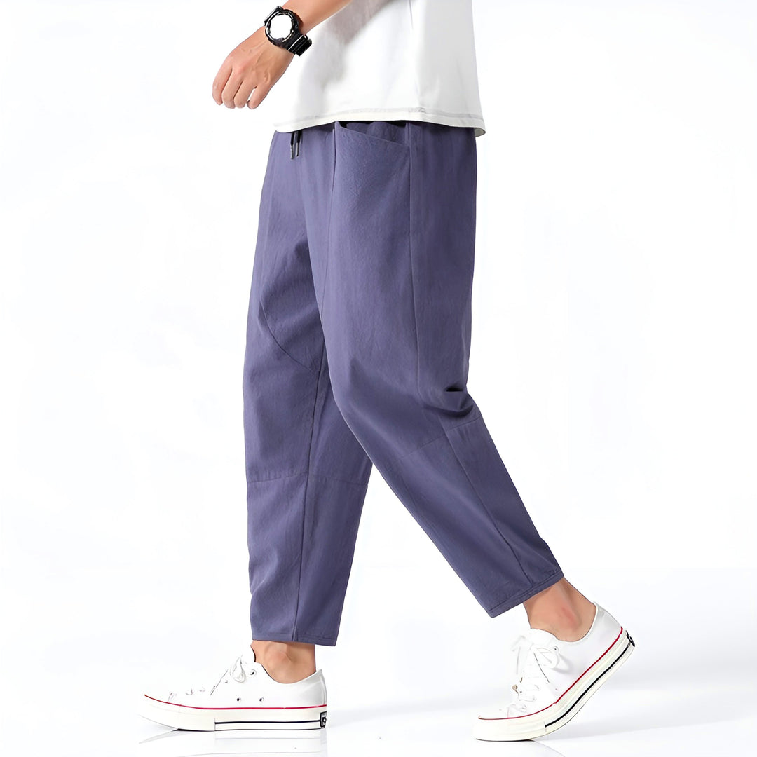 Men's casual cropped drawstring chino pants in a relaxed fit for effortless style.