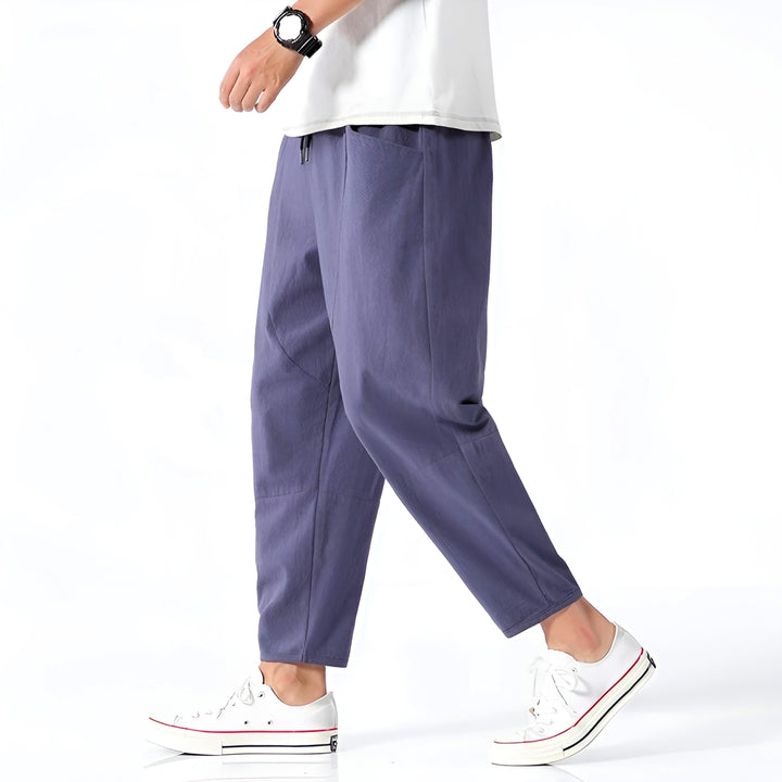 Men's casual cropped drawstring chino pants in a relaxed fit for effortless style.