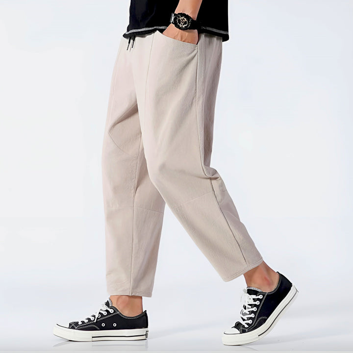 Everyday men's cropped chino pants, versatile with a drawstring for relaxed fit.