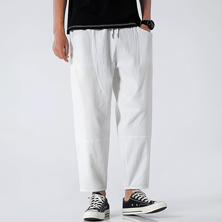 Durable men's casual cropped chino pants featuring a practical drawstring closure.