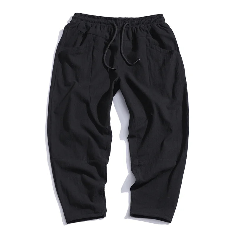 Men's fashionable cropped drawstring pants in a soft chino fabric for ultimate comfort.