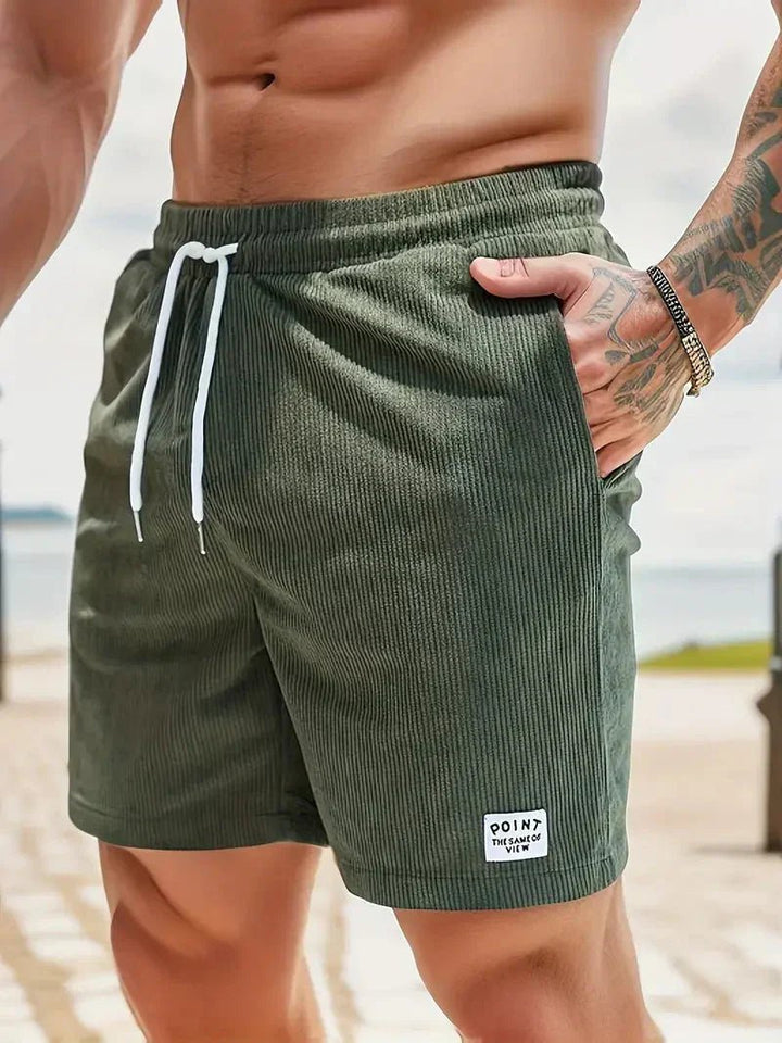 Men's casual drawstring shorts with an elastic waist, perfect for summer comfort and everyday wear.