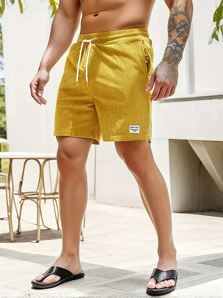 Stylish men's casual shorts with drawstring waist, comfortable and perfect for warm weather.