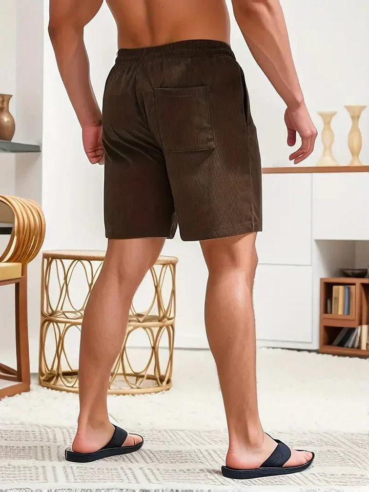 Men's comfortable shorts, elastic waist with adjustable drawstring, ideal for relaxed daily wear.