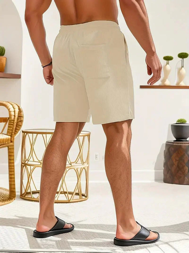 Men's everyday comfortable shorts, featuring a drawstring, elastic waist, and useful pockets.