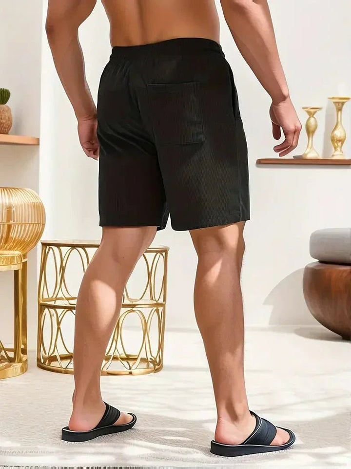 Comfortable men's casual shorts, elastic waist, drawstring for a relaxed fit and everyday wear.
