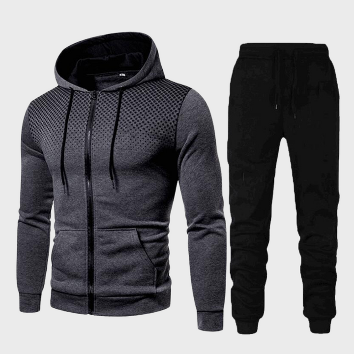 Athletic men's navy blue casual wear set with a hooded sweatshirt and drawstring joggers