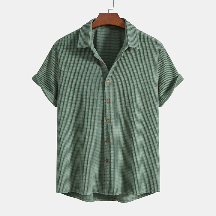 Stylish men's relaxed fit short sleeve shirt & drawstring shorts set. Casual two-piece summer outfit.