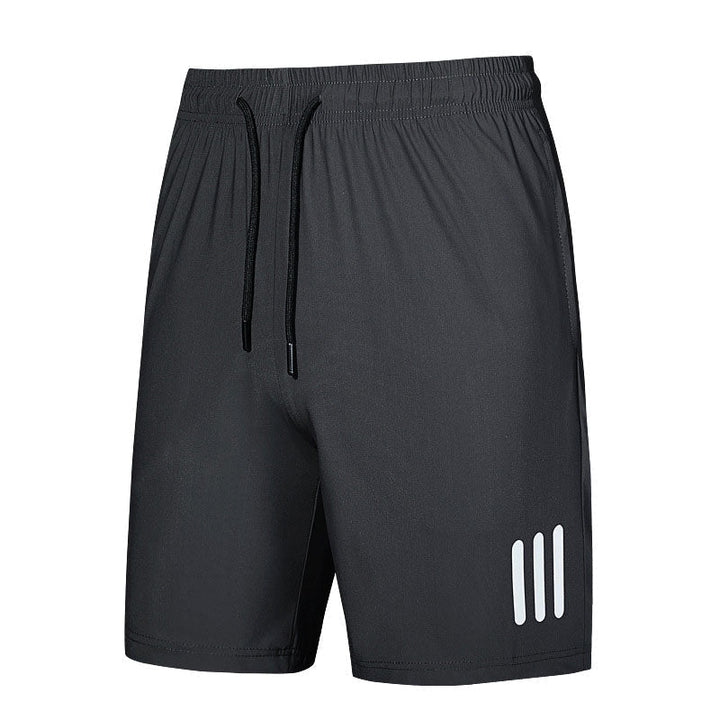 Close-up of men's athletic shorts, showcasing the elastic waistband and adjustable drawstring for a snug fit.