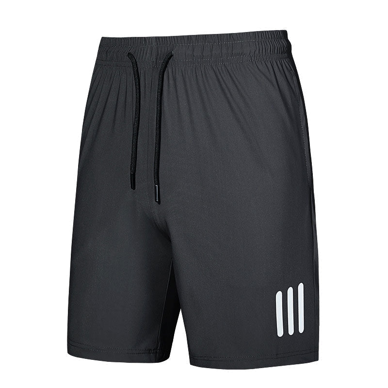 Detail of the polyester fabric on men's sports shorts, emphasizing its lightweight and quick-dry properties.