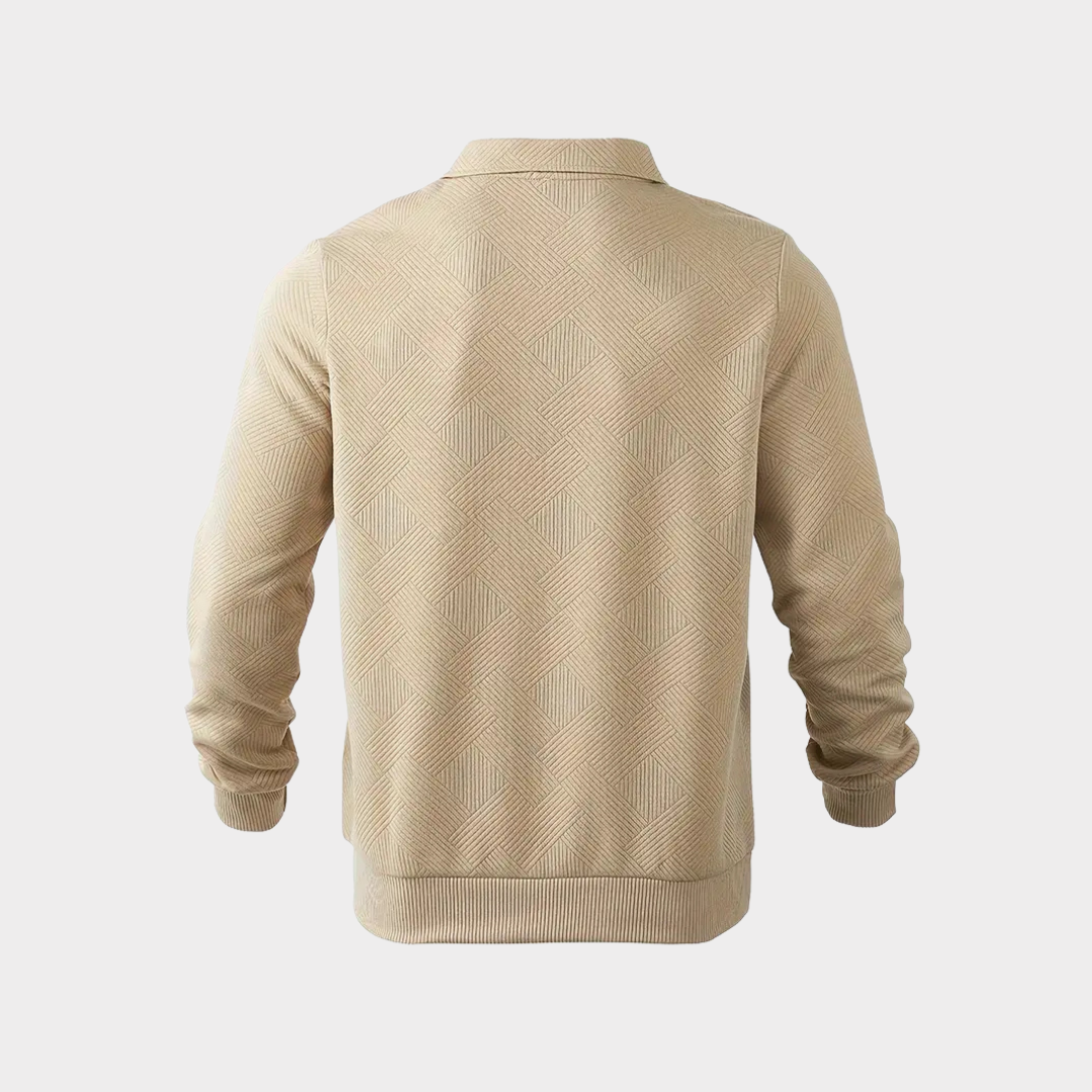 Side view of a man wearing a dark blue casual textured half-zip longsleeve pullover