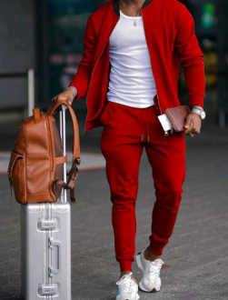 Beige men's athletic apparel, featuring a casual tracksuit with a practical zipper jacket and jogger pants.