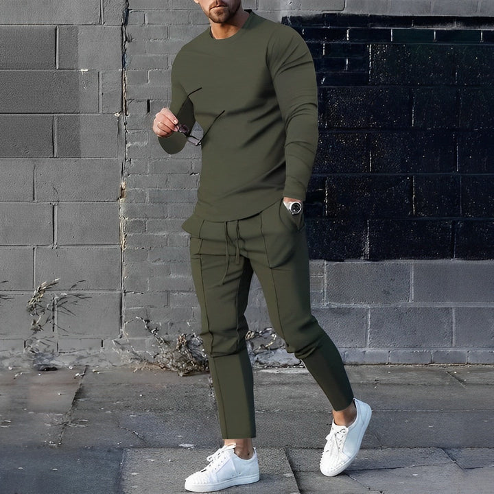Casual men's outfit featuring a two-piece jogger set for ultimate comfort.