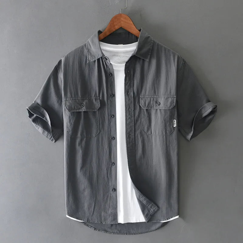 Stylish men's khaki short sleeve casual shirt, ideal for summer workwear or relaxed everyday fashion.