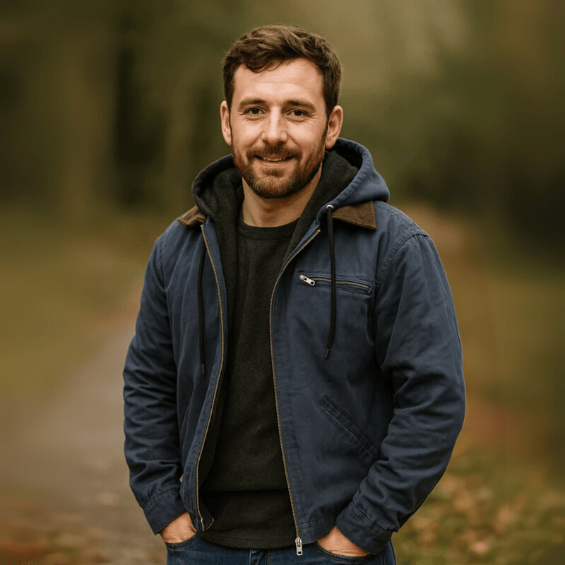 Detail of the hood and an adjustable drawstring on a men's zip-up casual jacket