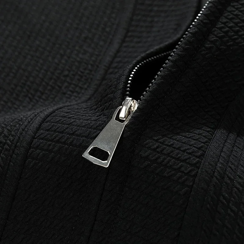 Relaxed fit men's zip-up sweater for stylish fall & winter fashion, a comfortable layering piece.