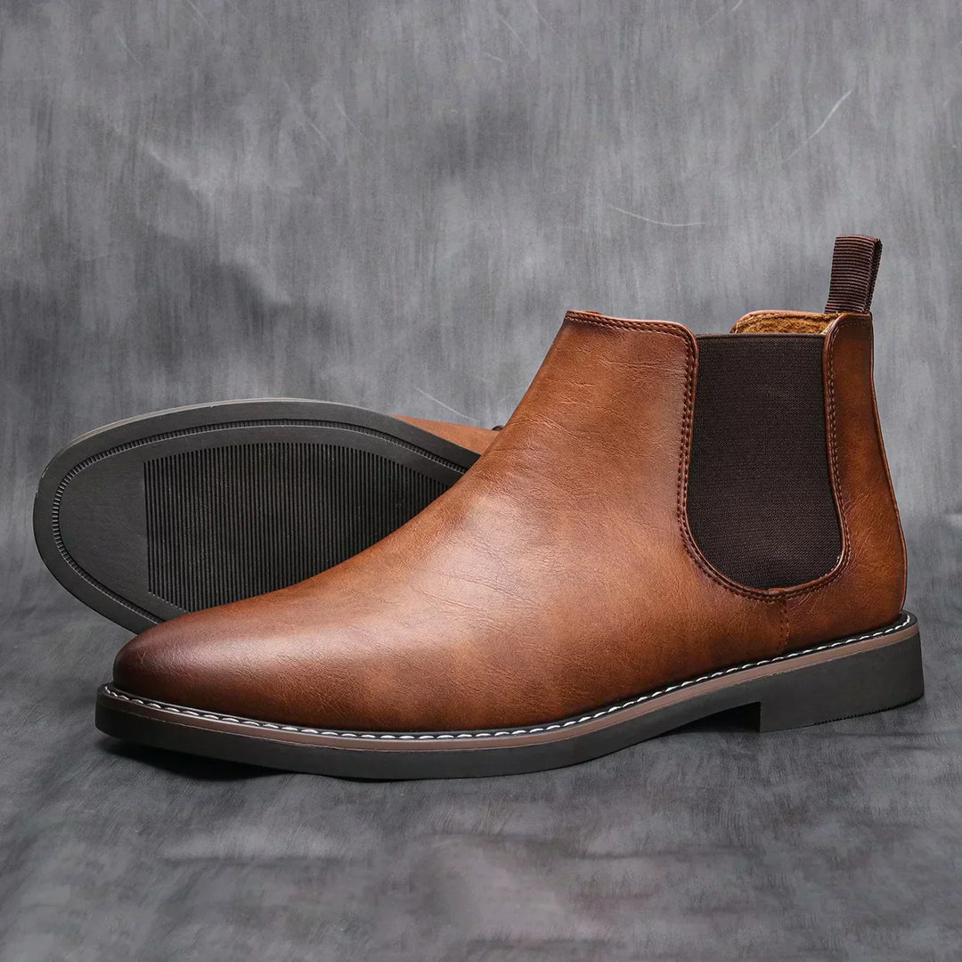 Comfortable men's classic Chelsea ankle boots, easy slip-on design for everyday fall wear.