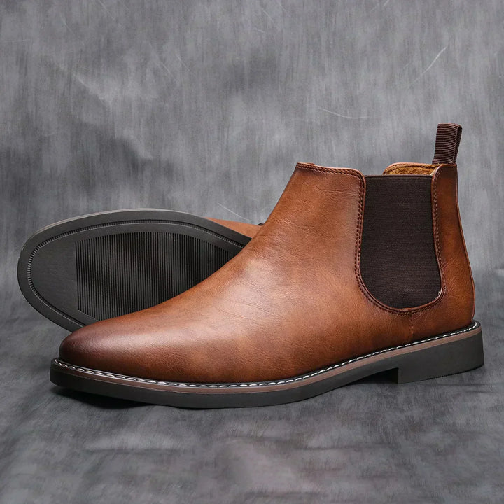 Comfortable men's classic Chelsea ankle boots, easy slip-on design for everyday fall wear.