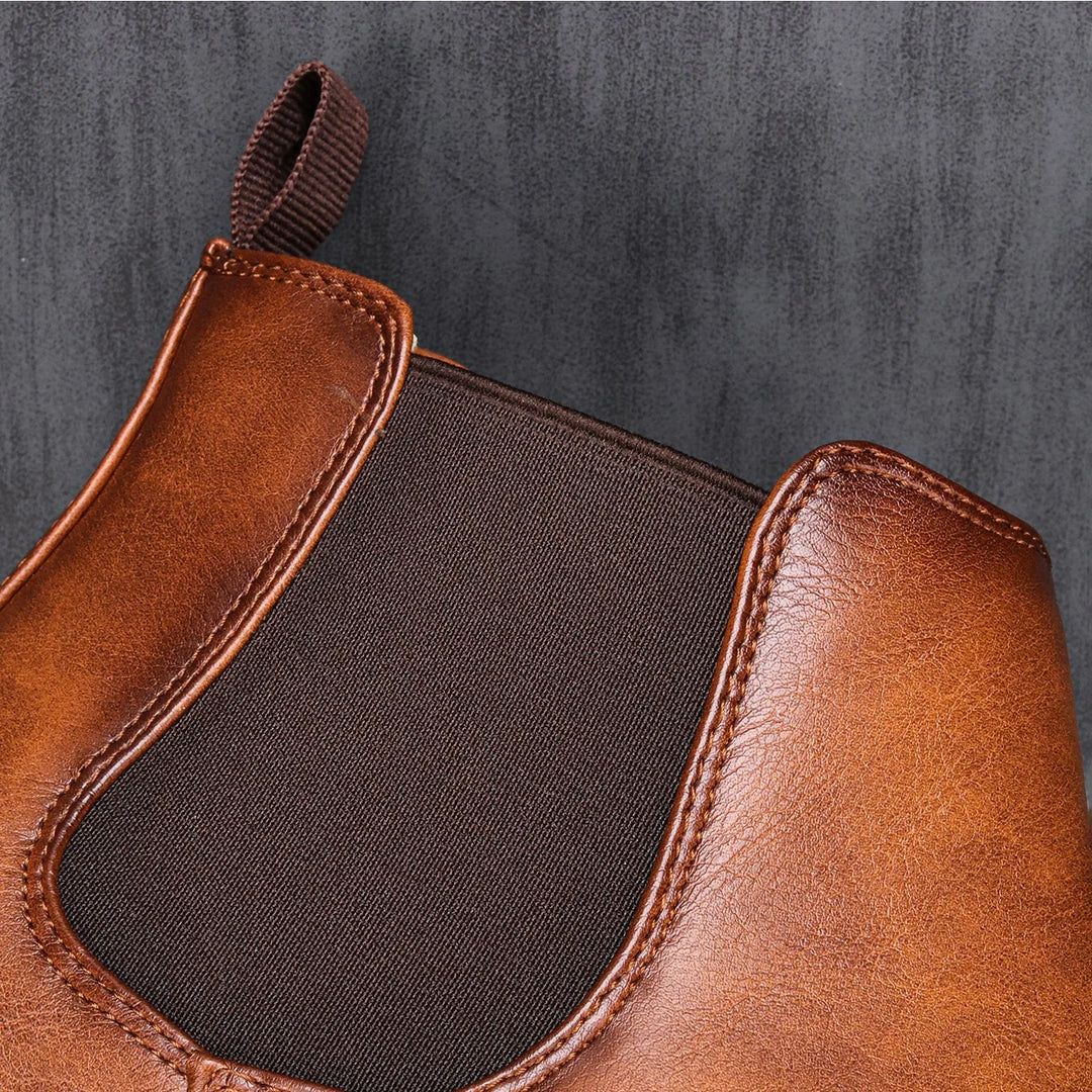 Stylish men's leather Chelsea boots, classic design, durable construction for autumn & everyday wear.