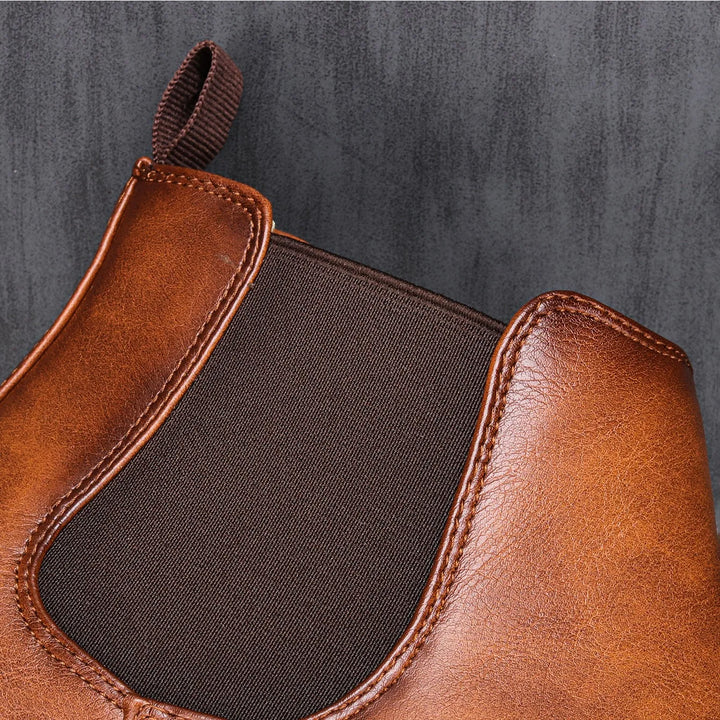 Stylish men's leather Chelsea boots, classic design, durable construction for autumn & everyday wear.