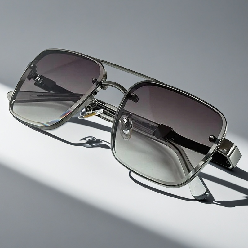 Sleek men's aviator sunglasses, gold frame, gradient lenses, offering classic style and UV protection.