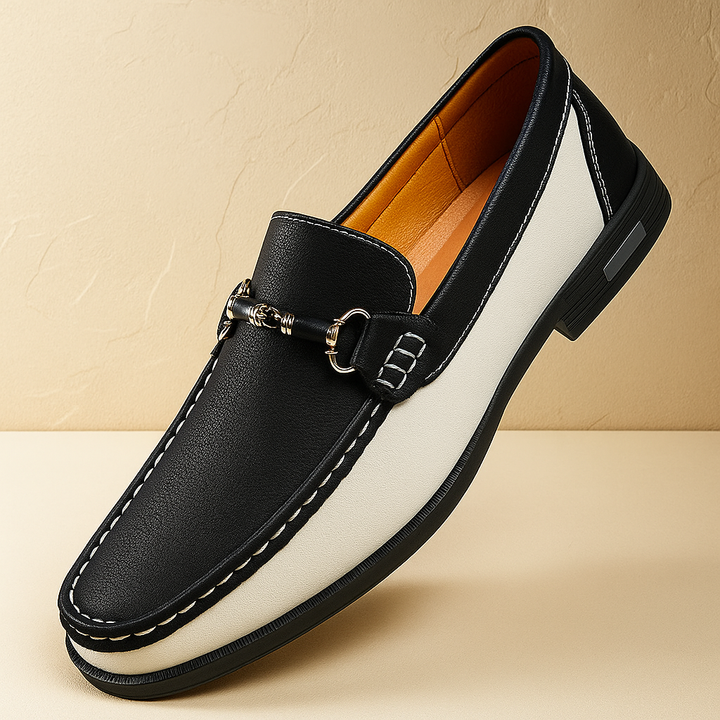 Side profile of men's bit loafers in rich brown leather, highlighting the elegant design and slip-on style