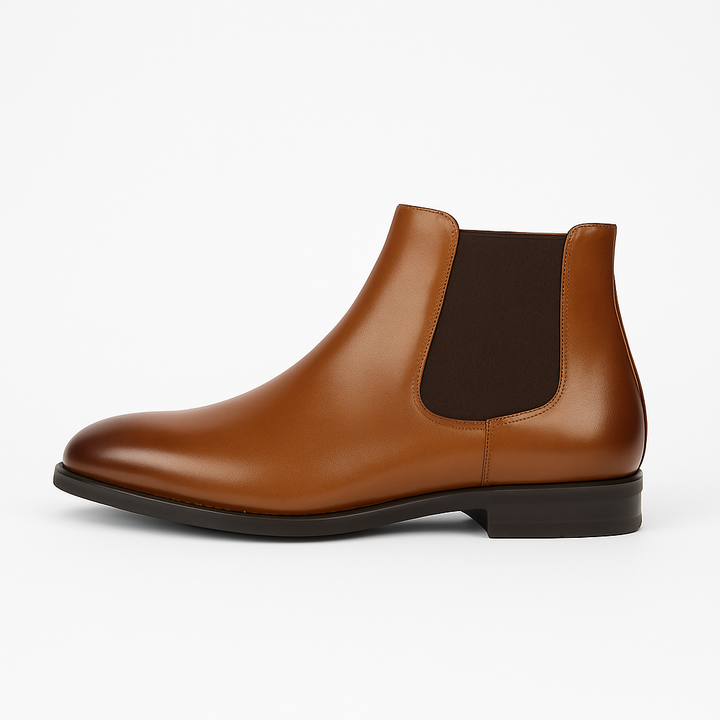 Black leather men's Chelsea boots with elastic side panels for easy slip-on, ideal for dress or casual wear.