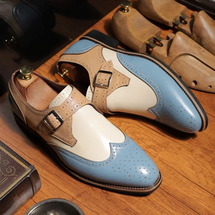 Top view of men's monk strap brogue shoes, showcasing the sleek, polished design