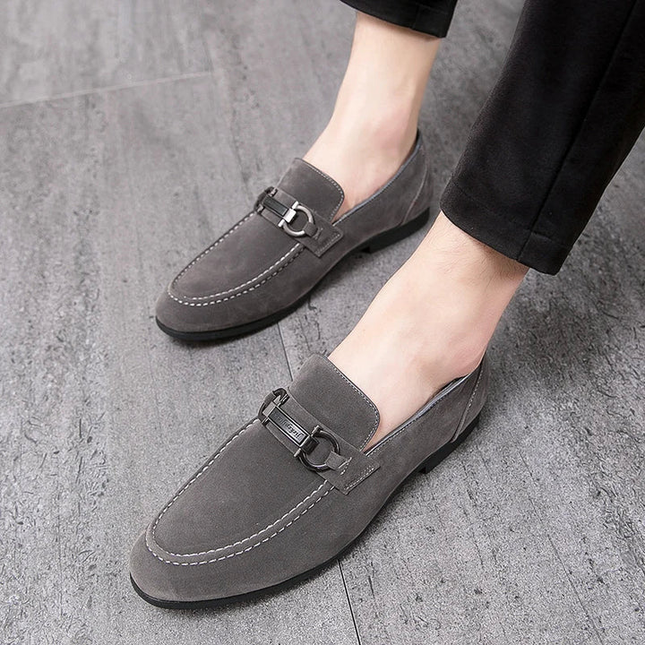 Comfortable men's navy suede bit loafers, ideal as versatile dress shoes.