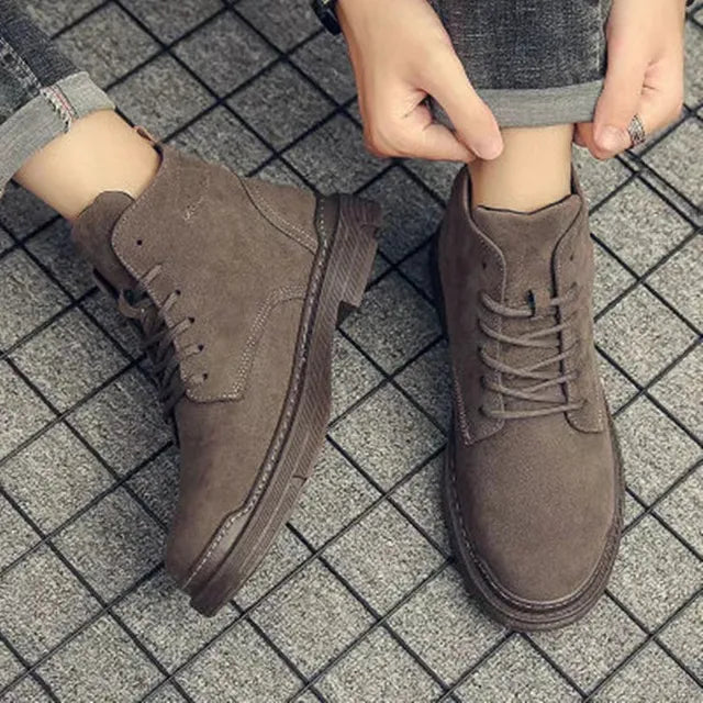 Durable men's brown suede boots with classic lace-up design, ideal for versatile everyday footwear.