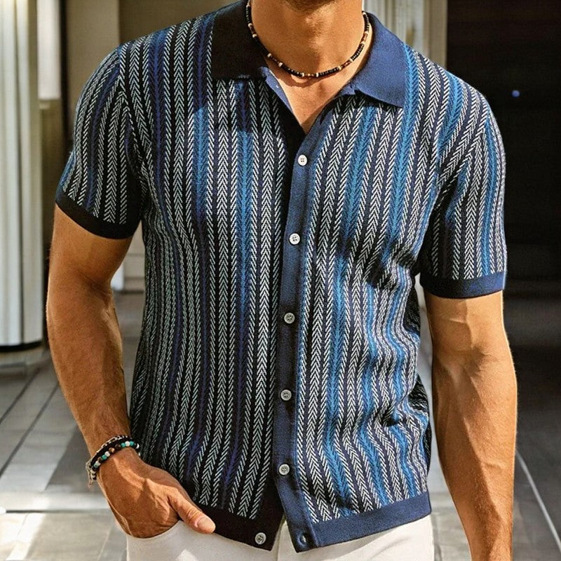 Close-up of men's button-down shirt. Detailed modern herringbone pattern, showcasing long sleeve classic men's apparel.