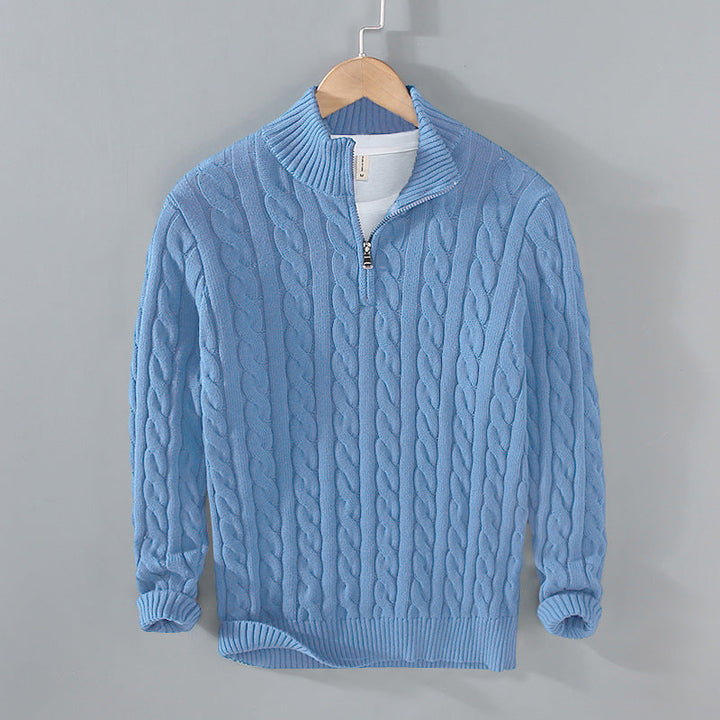 Classic men's knitwear: a comfortable cable knit half-zip sweater, a staple for men's fashion and warmth.