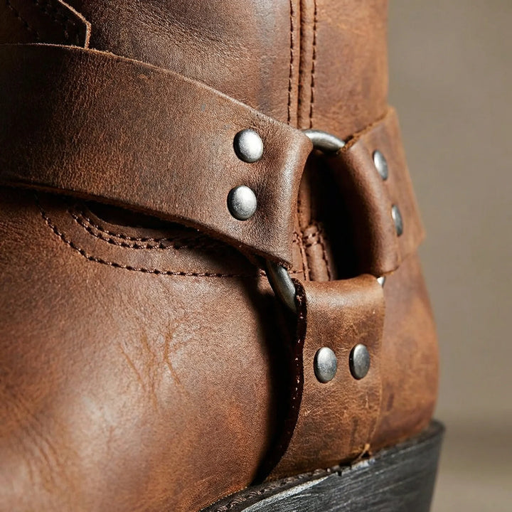 Allan men's classic cowboy boots. Timeless western style, featuring a distinctive studded strap design.
