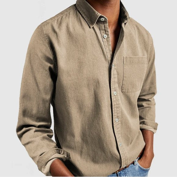 Stylish men's denim long sleeve shirt with a classic button-down design, suitable for everyday fashion.