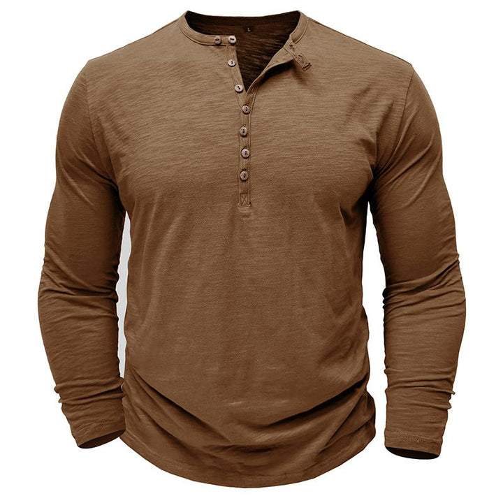 Men's henley shirt featuring a crew neck and long sleeves, great for layering.