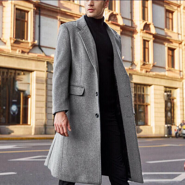 Stylish men's long wool winter coat, designed for warmth and classic cold weather fashion. Ideal for layering.