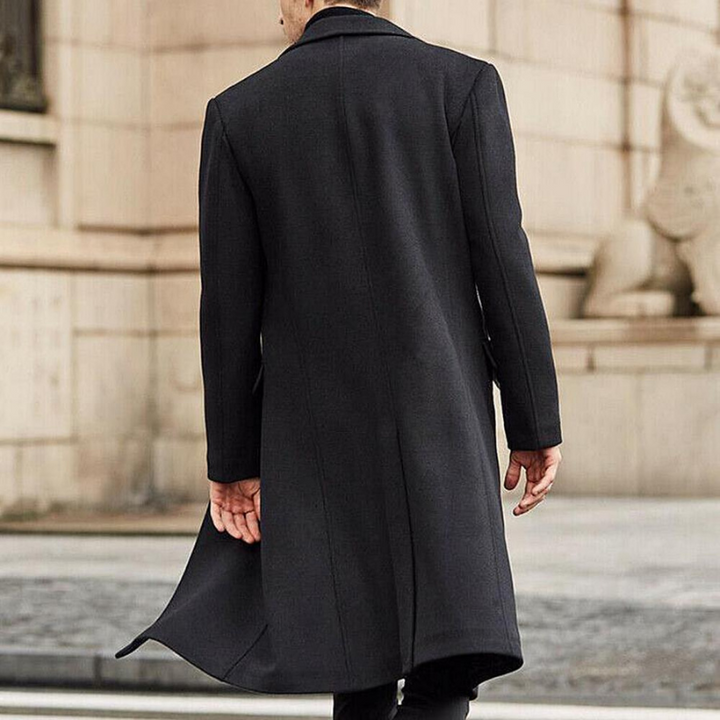 Classic men's long wool overcoat for winter. Stay warm in style, ideal as formal or business cold weather outerwear.