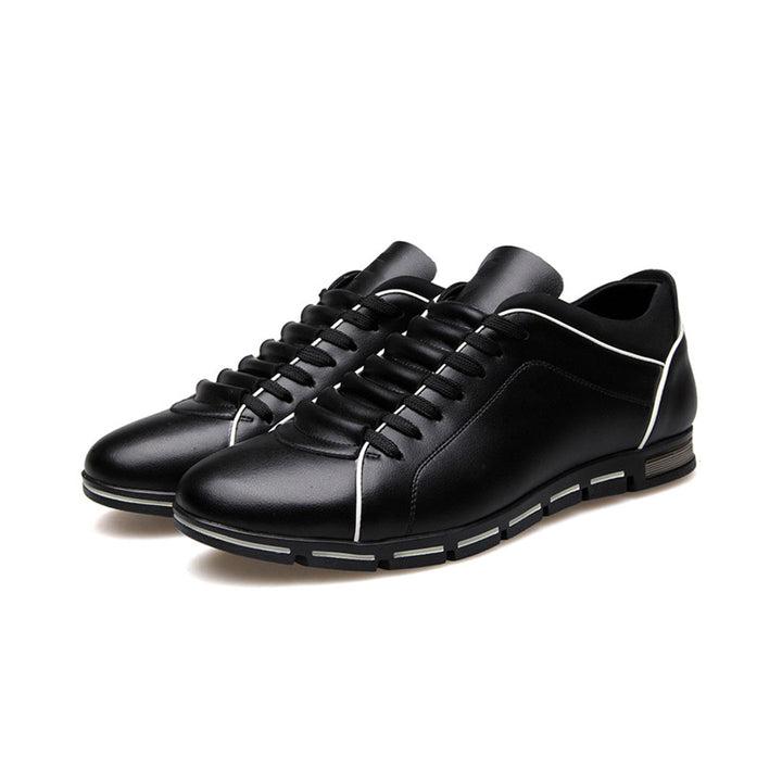 Classic men's low-top sneakers, a comfortable & stylish choice for business casual outfits.