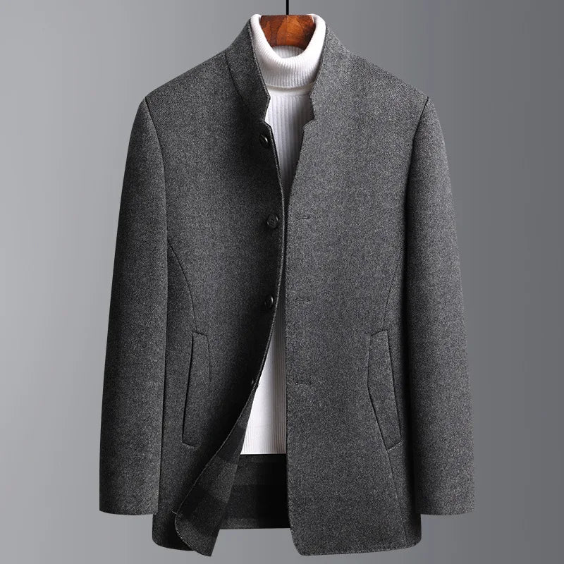 A man wearing a sophisticated classic mid-length wool-cashmere coat. Perfect for business or casual fall fashion.