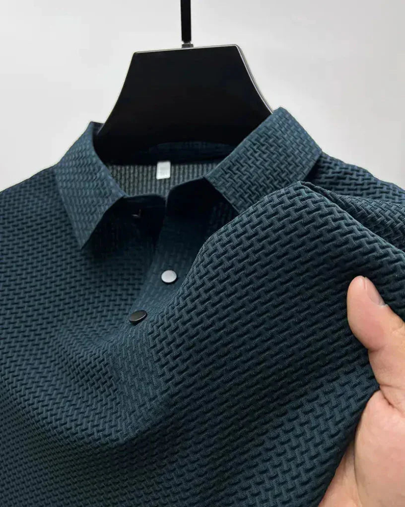 Menswear classic polo shirt with short sleeves, ideal for smart casual or workwear. Offers versatility & everyday comfort.