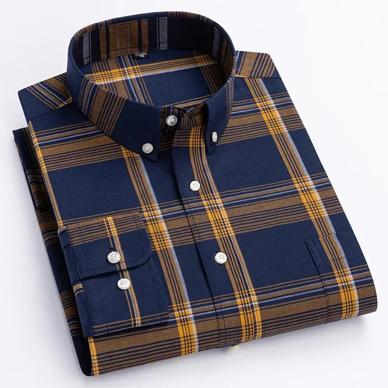 Close-up of a men's long sleeve plaid shirt, showcasing the fabric texture and button detail