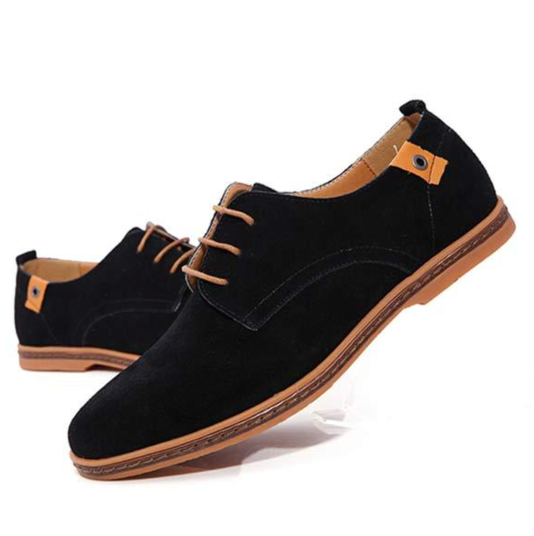 Polished leather round-toe dress shoes for men. Ideal formal footwear for a smart casual look.
