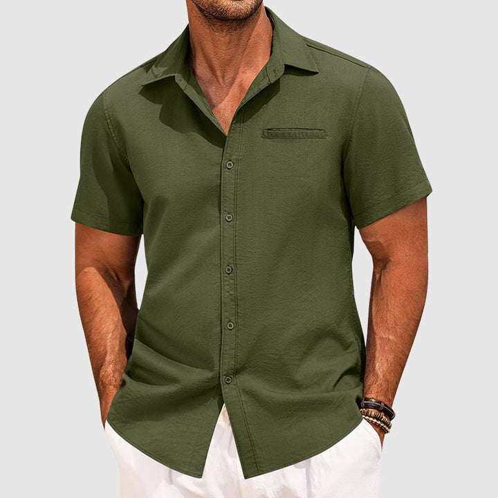 Men's classic short-sleeve button-down summer shirt with chest pocket, ideal for warm weather.