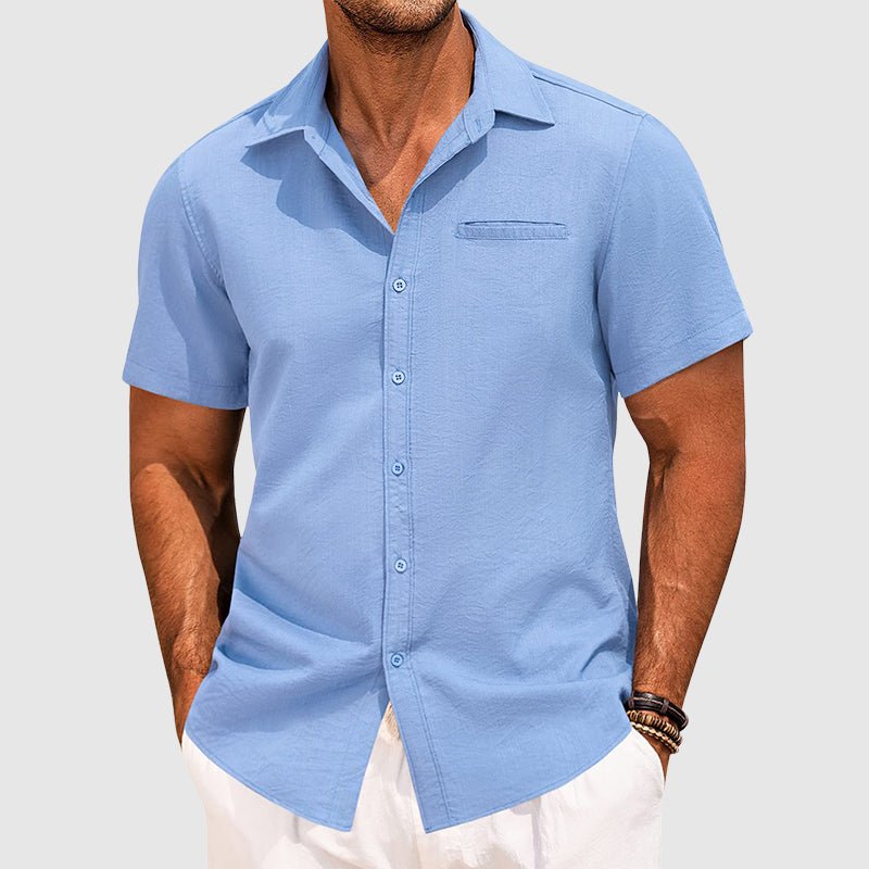 Stylish men's casual button-down summer shirt with chest pocket, perfect for semi-formal warm weather wear.