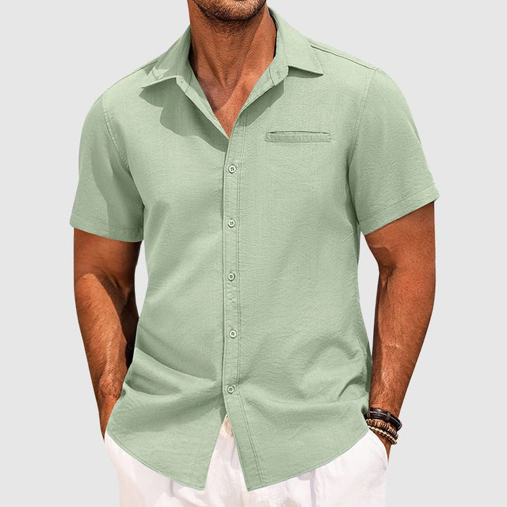Versatile men's button-down shirt: short sleeves, chest pocket, classic fit. Great for summer & casual occasions.