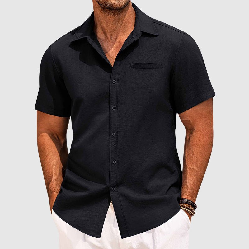 Essential men's short-sleeve button-down summer shirt with chest pocket for casual to semi-formal warm weather.