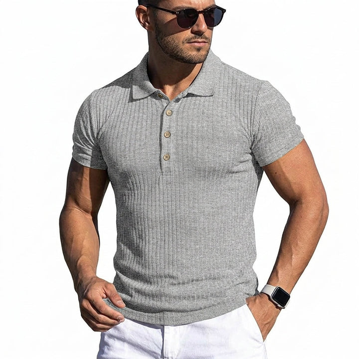 Versatile men's collared polo shirt. Soft, breathable fabric for casual or smart casual looks.