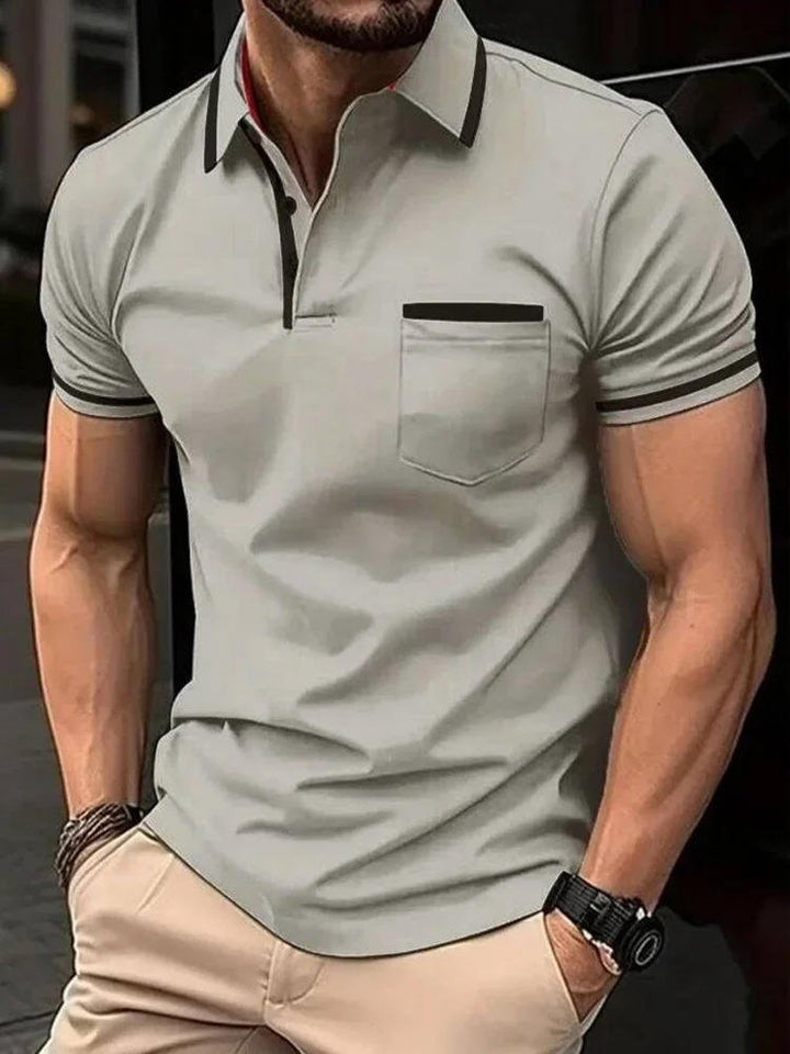 Classic fit men's short sleeve polo with chest pocket for versatile everyday fashion and comfort.