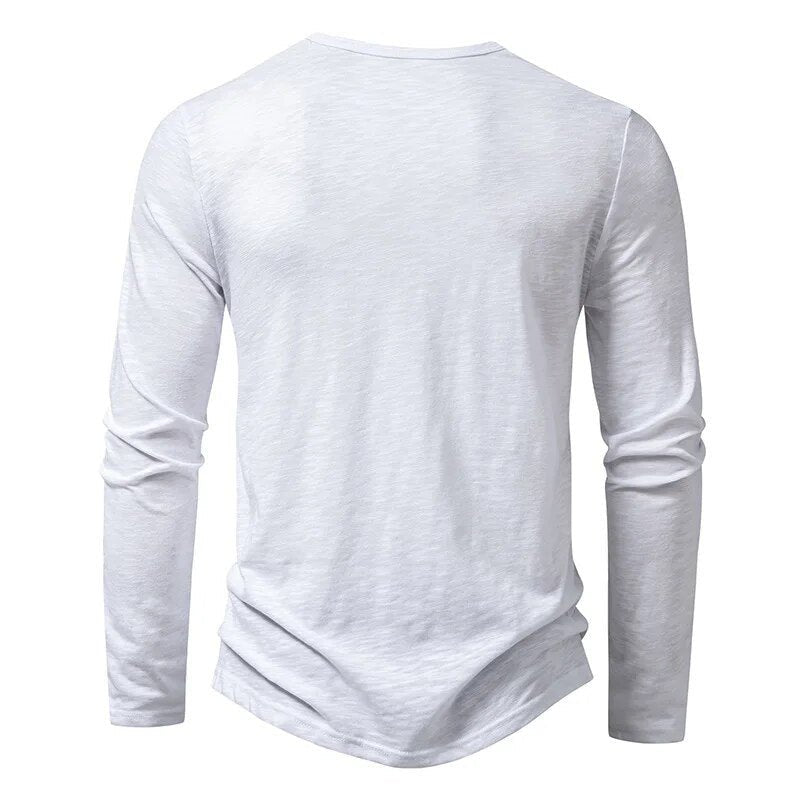 Streamlined men's slim fit henley, long sleeve, providing a sleek & modern casual silhouette.